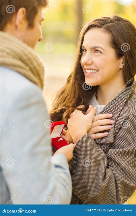 Man Proposing To A Woman In The Autumn Park Stock Image Image 34771343