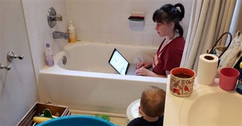 Photo Of Mom Working In A Bathtub During Pandemic Goes Viral Motherhood Isn T A Favor