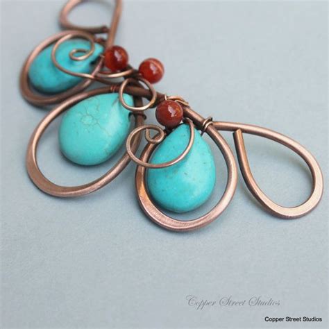 Turquoise Howlite And Red Carnelian Stones Shaped Into A Flower Give