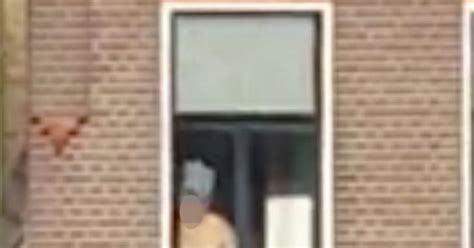 half a town see footage of naked female neighbour after builders filmed her and posted it online