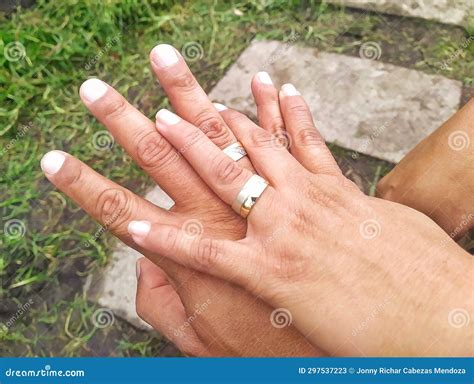 Interlaced Hands With Engagement Rings Stock Image Image Of Finger