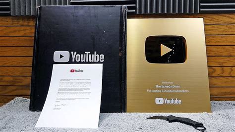 Youtube golden play button unboxing! THE NEW YOUTUBE GOLD PLAY BUTTON! - YouTube