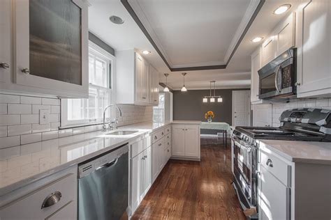 Painted cabinets in repose gray and gauntlet gray. Prairie Village renovation by Kelly Wells Real Estate and Element Construction - Sherwin ...