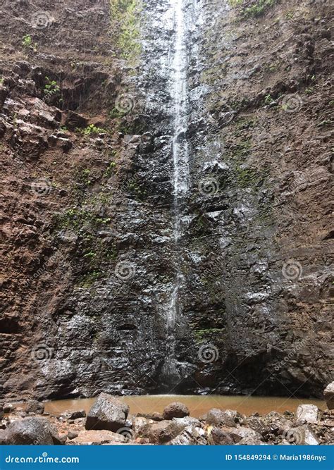 Waterfall In Milolii Valley During Rain On Napali Coast On Kauai Island