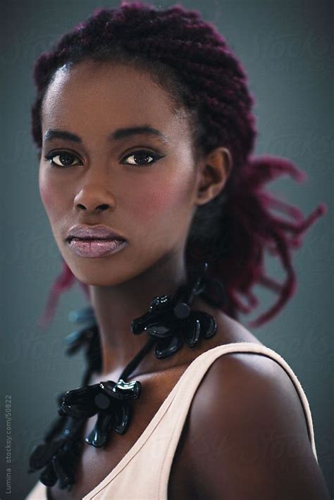 african woman with pink dreadlocks by lumina women beautiful dark skin black women