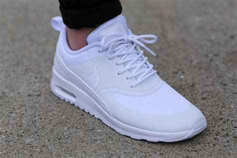 Take for example the swoosh logo of nike being done up in black. Nike Air Max Thea - All White