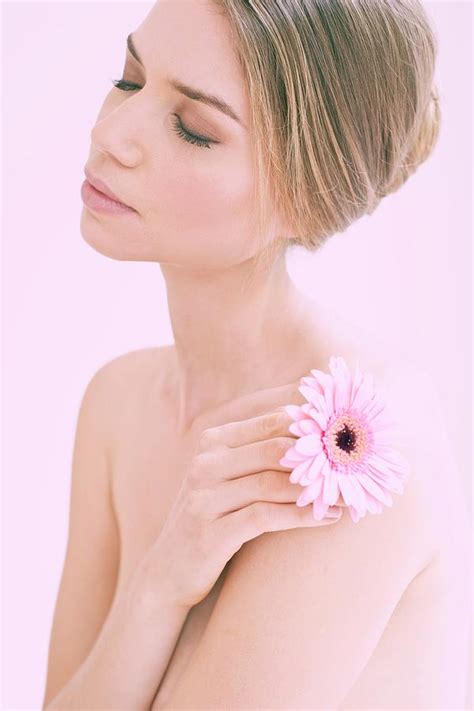 Woman Holding Flower Photograph By Ian Hootonscience Photo Library