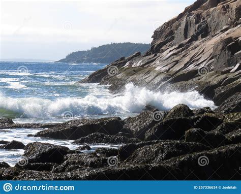 Waves Crashing Onto Rocky Shores Of Acadia National Park Stock Photo