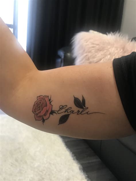 Arm Rose Tattoo With Name On Stem Viraltattoo