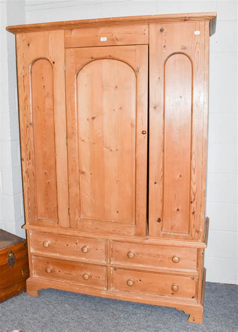 Lot 1252 A Modern Pine Wardrobe Fitted With Four