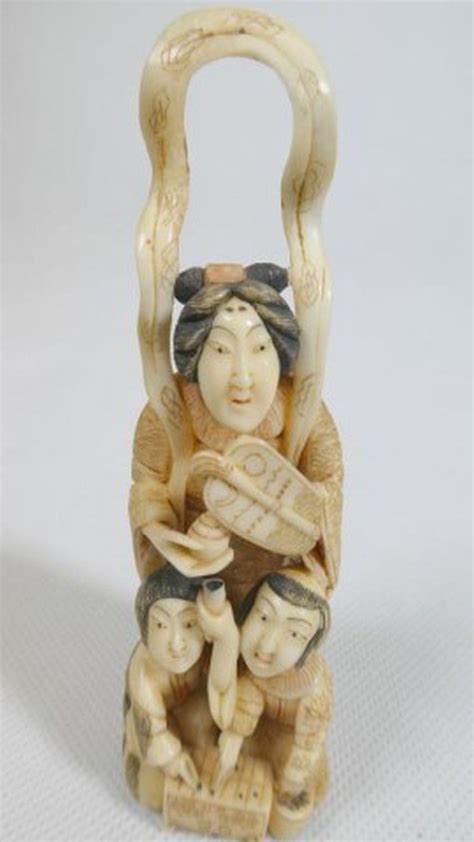 Antique Ivory Okimono Depicting Three Figures