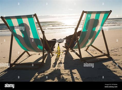 People Sitting In Deckchairs High Resolution Stock Photography And Images Alamy