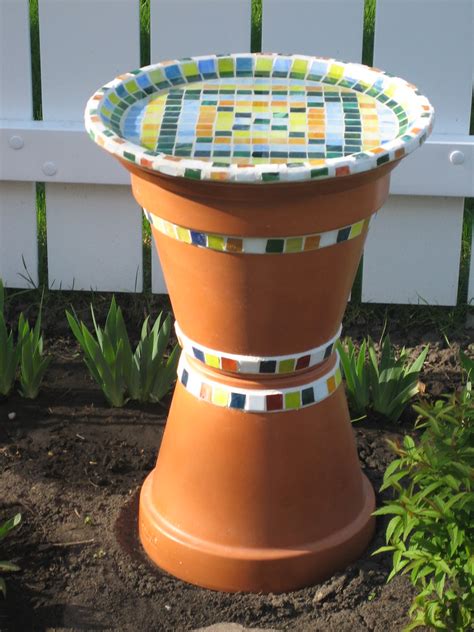 The easiest bird bath water fountain you will ever make, and cheap too, and it brings hummingbirds, wrens, sparrows, gold. Mom's homemade bird bath | thalling55 | Flickr