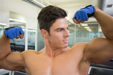 Shirtless Muscular Man Flexing Muscles In Gym Stock Photo Image Of