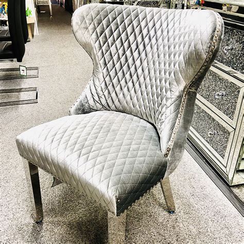 Whether you want a modern trend or a baroque classic, we're sure to have the dining chairs you're looking for. Diana Wide HQ Metallic Silver Velvet And Chrome Dining ...