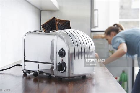 Woman Making Breakfast In A Hurry Photo Getty Images
