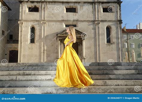 women in yellow dresses in the square stock image image of lifestyle concept 203634077
