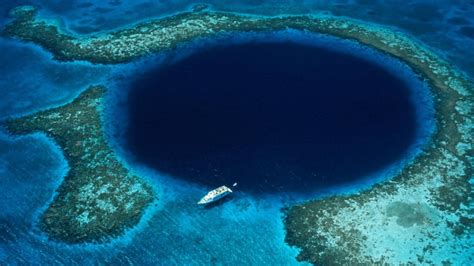 The belize blue hole is located approximately 100 kilometers (62 miles) offshore of belize city. Great Blue Hole, Belize - YouTube