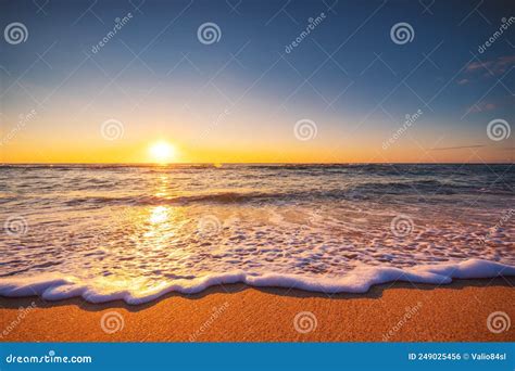 Beautiful Sunrise Over The Sea Waves And Beach Island In The Ocean