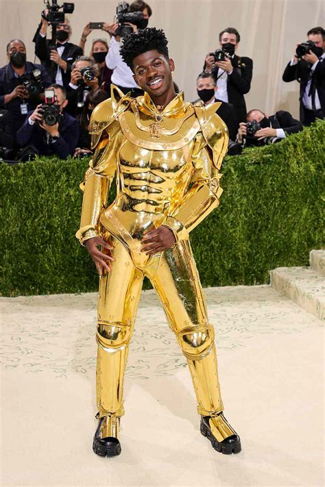 Lil Nas X Arrives At Met Gala In Sexy Gold Jumpsuit