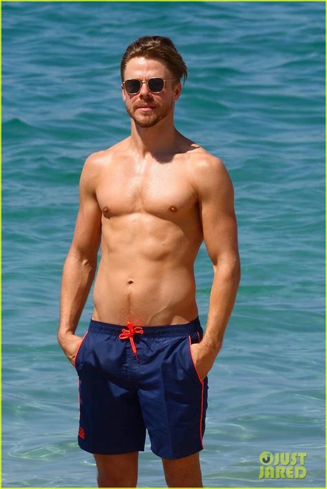 Shirtless Derek Hough Hits The Beach With Girlfriend Hayley Erbert In