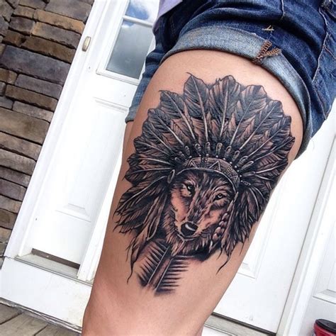 See more ideas about tattoos, body art tattoos, tattoo designs. Engraving style colored thigh tattoo of Indian wolf in ...