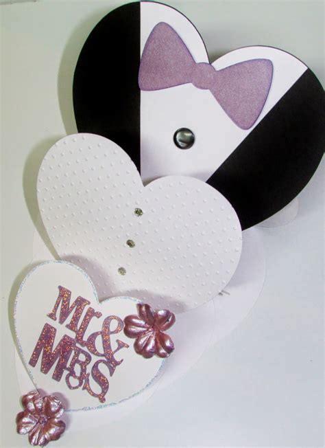 I wanted to share a quick video with you on how to make a simple shape card from images that are widely available to you and they are so fun to make. Carol's Creations: Mr. & Mrs. Triple Heart Shape Easel card