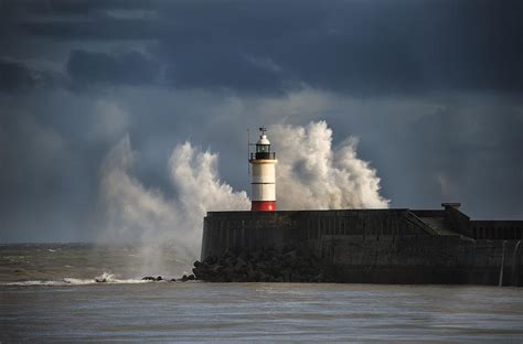 Large Sea Waves Crashing Over Lighthouse During Storm With Beaut