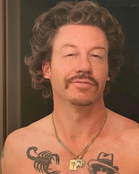 Macklemore Debuts Quarantine Glow Up With Scruffy Goatee And Curly