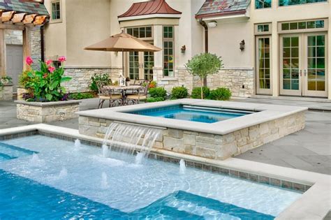 When considering the purchase of your leading edge pool, a great way to add ambience and tranquility is by adding optional water and lighting features. Inground Pool & Spa - Traditional - Pool - chicago - by ...