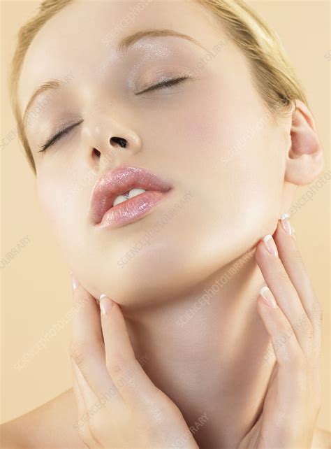 Woman Touching Her Face Stock Image P7010439 Science Photo Library