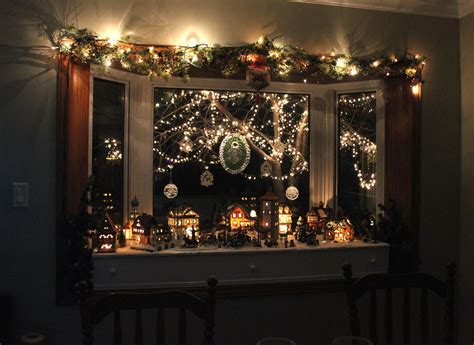 Display christmas cards, hang wreaths or suspend ornaments with festive ribbon over your windows, as we did here. Kathrin's Blog: December 2011