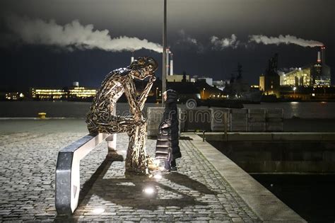 Modern Metallic Art Street Sculpture Thinking Man On The Waterfront In