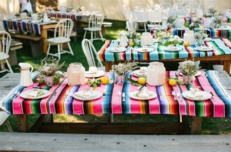Hanging decorations like fluffies and traditional papel picado (cut paper) garland add a rainbow of saturated color. 10 Things to Pull Off a Mexican Inspired Quinceanera