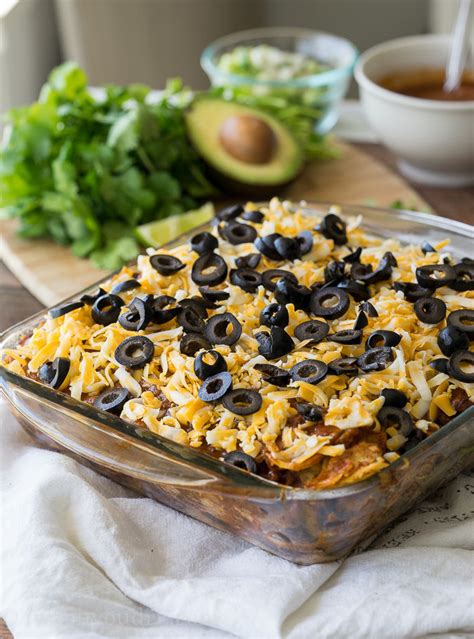 These ones are full of chicken, black beans, corn, and plenty of cheese and enchilada sauce. Layered Chicken Enchilada Casserole : Green Chile Chicken Enchilada Casserole Life In The ...