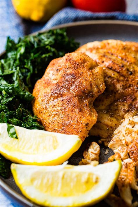 Smoked whole chicken is a juicy, delicious, and affordable way to make a dinner for your entire family. Easy Smoked Chicken on a Traeger - Oh Sweet Basil