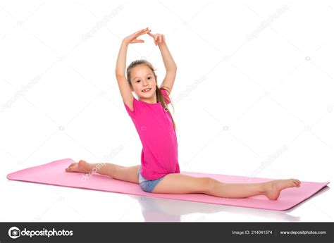 Girl Gymnast Perform The Twine Exercise Stock Photo By Lotosfoto