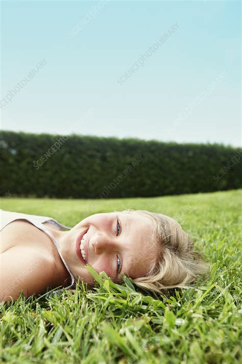 Smiling Girl Laying In Grass Stock Image F0049703 Science Photo
