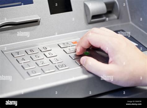 Human Hand Enter Atm Banking Cash Machine Pin Code Stock Photo Alamy