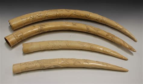 An Early 20th Century African Fully Carved Ivory Tusk Worked In