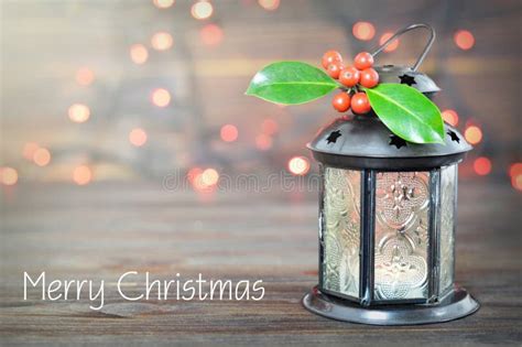 Merry Christmas Card With Christmas Lantern And Christmas Holly Stock