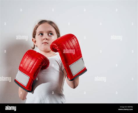 Little Girl In Boxing Gloves On White Background Stock Photo Alamy