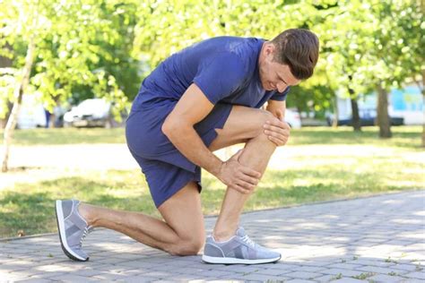 Man Suffering From Pain In Leg Stock Image Everypixel