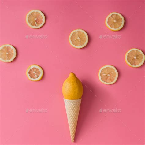 Lemon Fruit In Ice Cream Cone With Lemon Slices On Pink Background Stock Photo By Zamurovic