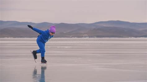 The Child Train On Ice Professional Speed Skating The Girl Skates In