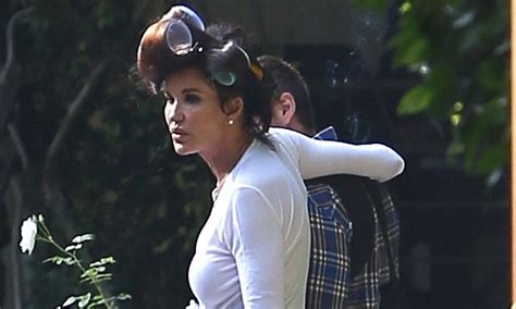 Blushing Bride Janice Dickinson Puffs On A Cigarette With Curlers In