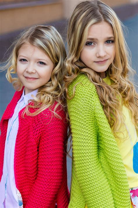 Portrait Of Two Beautiful Blonde Girls Stock Image Image Of Portrait Sisters 80853577