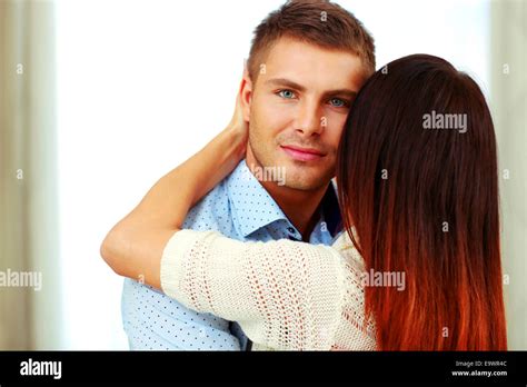 Portrait Of A Young Couple Hugging Stock Photo Alamy