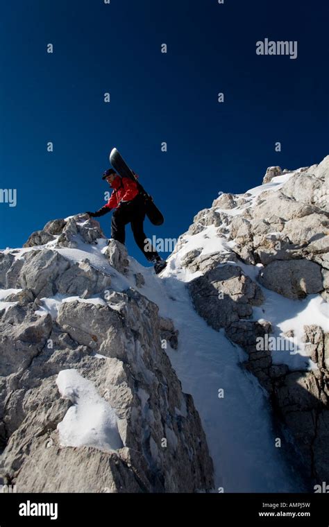 Hiking In The Snowy Mountains Stock Photo Alamy