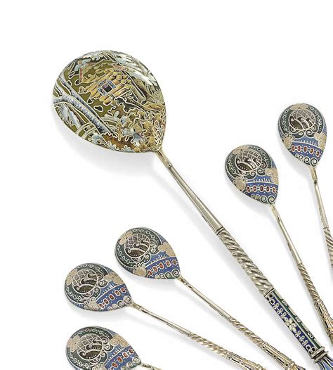 A Silver Gilt And CloisonnÉ Enamel Serving Spoon And A Set Of Six